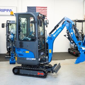 Rippa R15 Eco with enclosed cab mini excavator shown in showroom in Portland Oregon, front and side profile