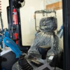 Interior of Rippa R15 Eco cab showing operator seat, climate fan, fire extinguisher, and safety features