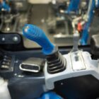 Rippa R15 Eco mini excavator joystick controls inside enclosed cab for precise operation