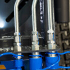 Rippa RS03 skid steer auxiliary hydraulic lines and quick coupler connections