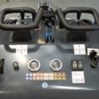 Rippa RS03 skid steer operator controls with dual joysticks, gauges, and ignition