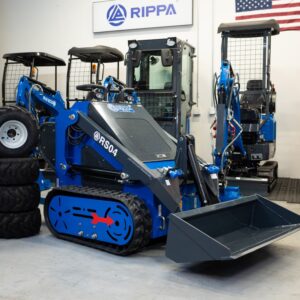 Rippa RS04 skid steer mini excavator with bucket attachment shown in Portland Oregon showroom