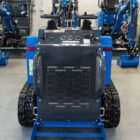 Rear view of Rippa RS04 skid steer mini excavator showing engine cover and cooling vents